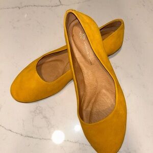 Vibrant Yellow Flats by Antonio Melani